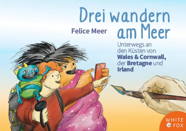 Drei wandern am Meer